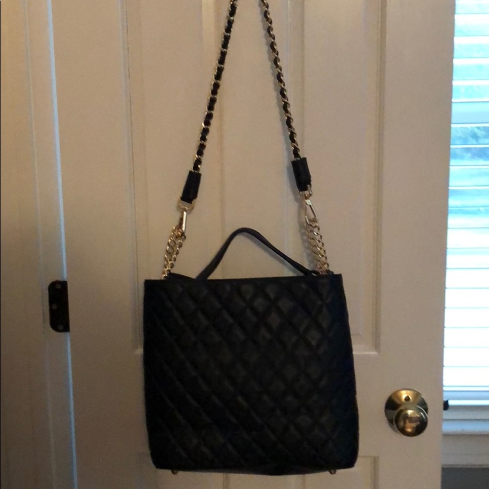 New black leather quilted purse